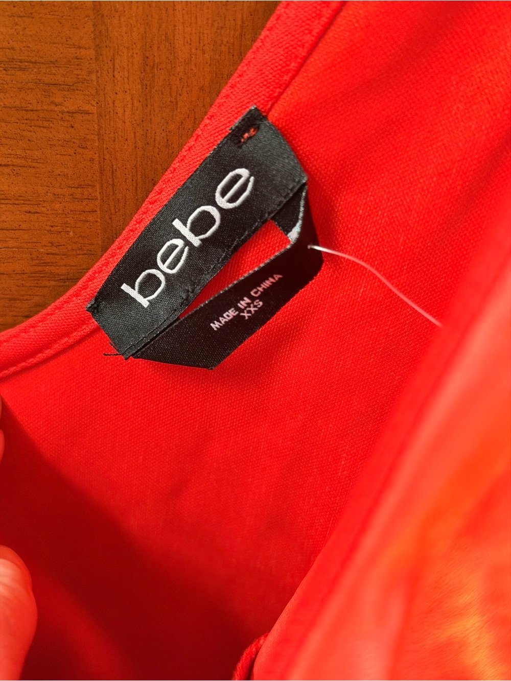BEBE Red Vegan Leather Ruffled V-Neck Midi Dress with Tie Belt - Picture 5 of 6
